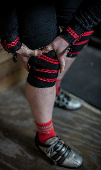 Squat met Harbinger Red Line Knee Wraps